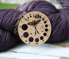 Load image into Gallery viewer, Luna Moth Knitting Needle Gauge in Cherry with Bronze Clasp